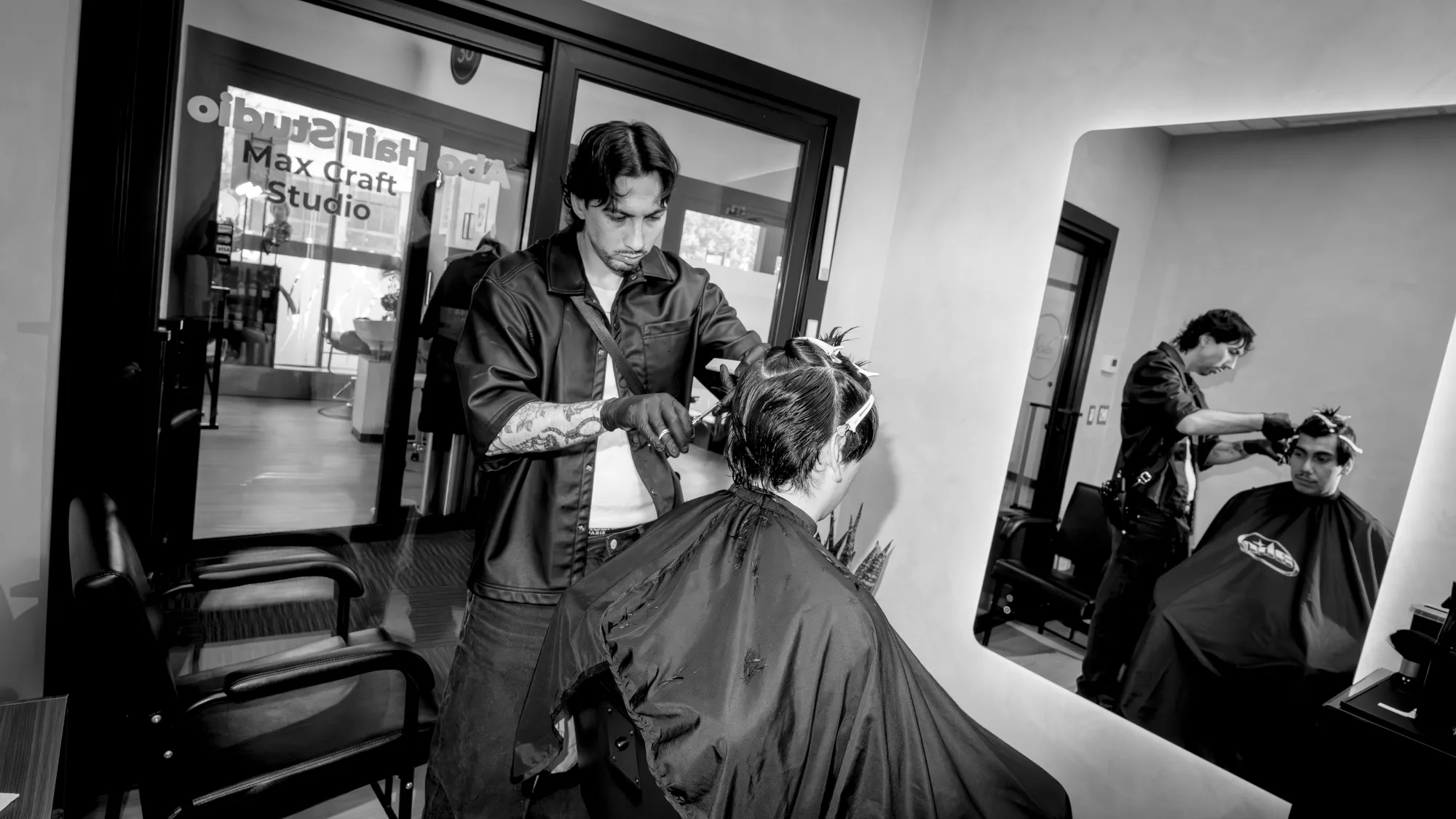 Gabo cutting hair at Abo Hair Studio inside Sola Salons in Boston